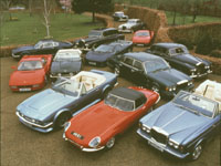 Elton John - several of his cars in the driveway